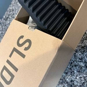 Brand New Onyx Yeezy Slides.